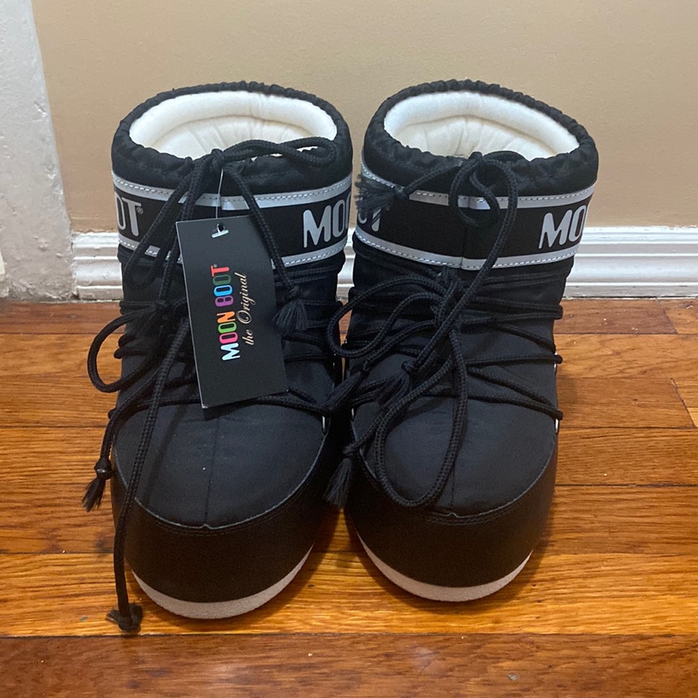 Low moon boots black and white from saks